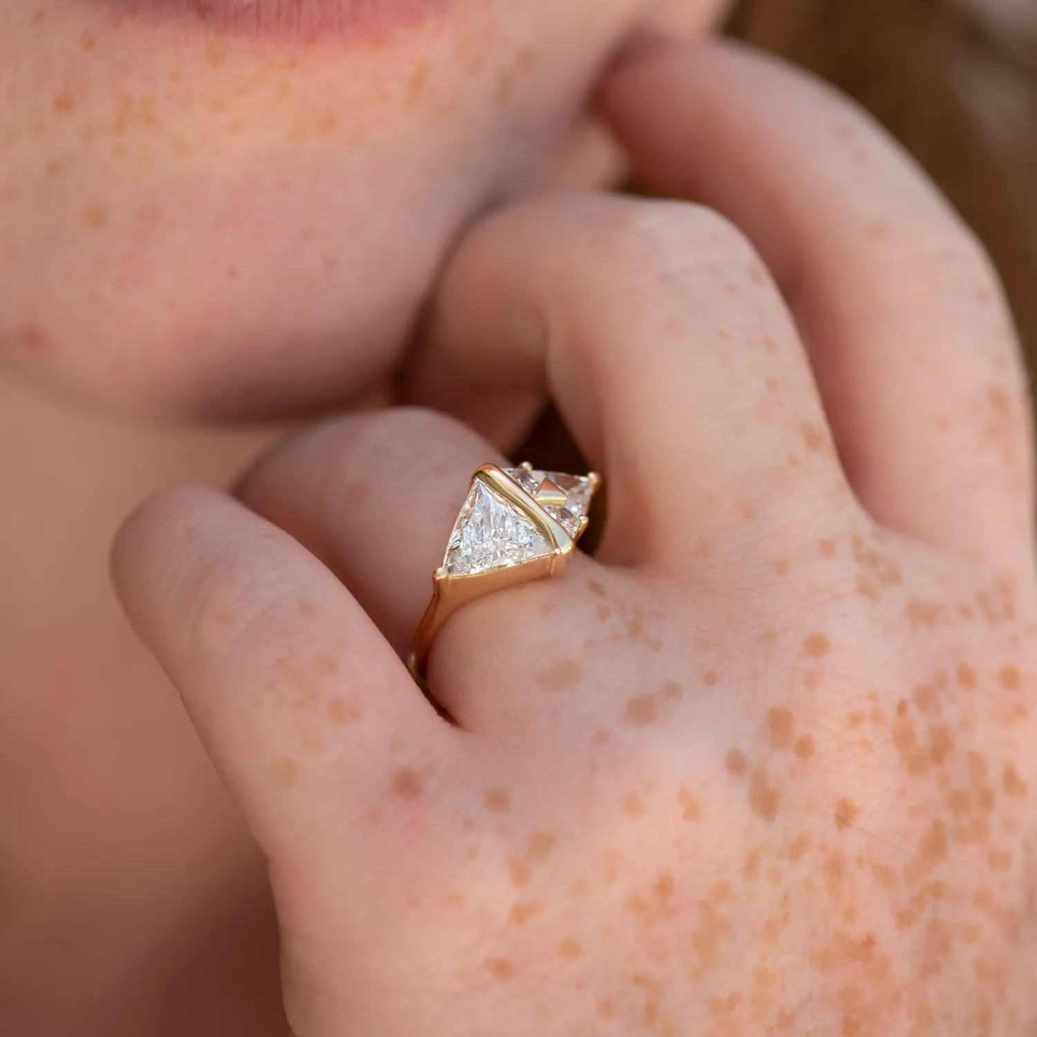 Pyramid Engagement Ring with Trillion and Trapeze Cut Diamonds